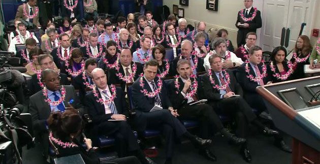 White House Press Corps wearing Hawaiian leis