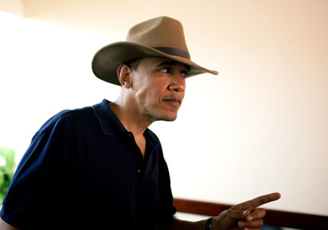 Obama pointing in cowboy hat
