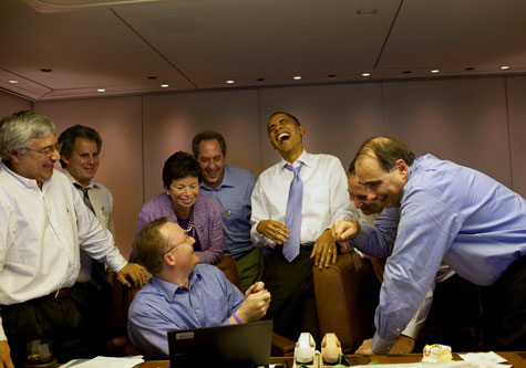 Obama laughing with Robert Gibbs David Axelrod Valerie Jarrett