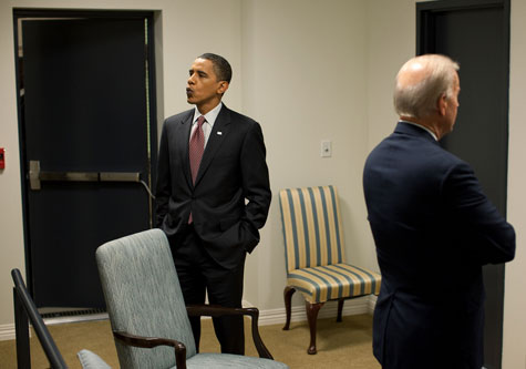 President Obama whistles while waiting for something to do