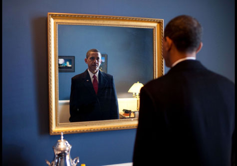 Obama looks at himself in the mirror 