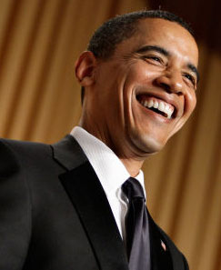 President Obama laughing at his own joke