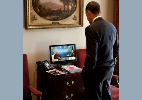 Obama watching Oprah on TV in oval office